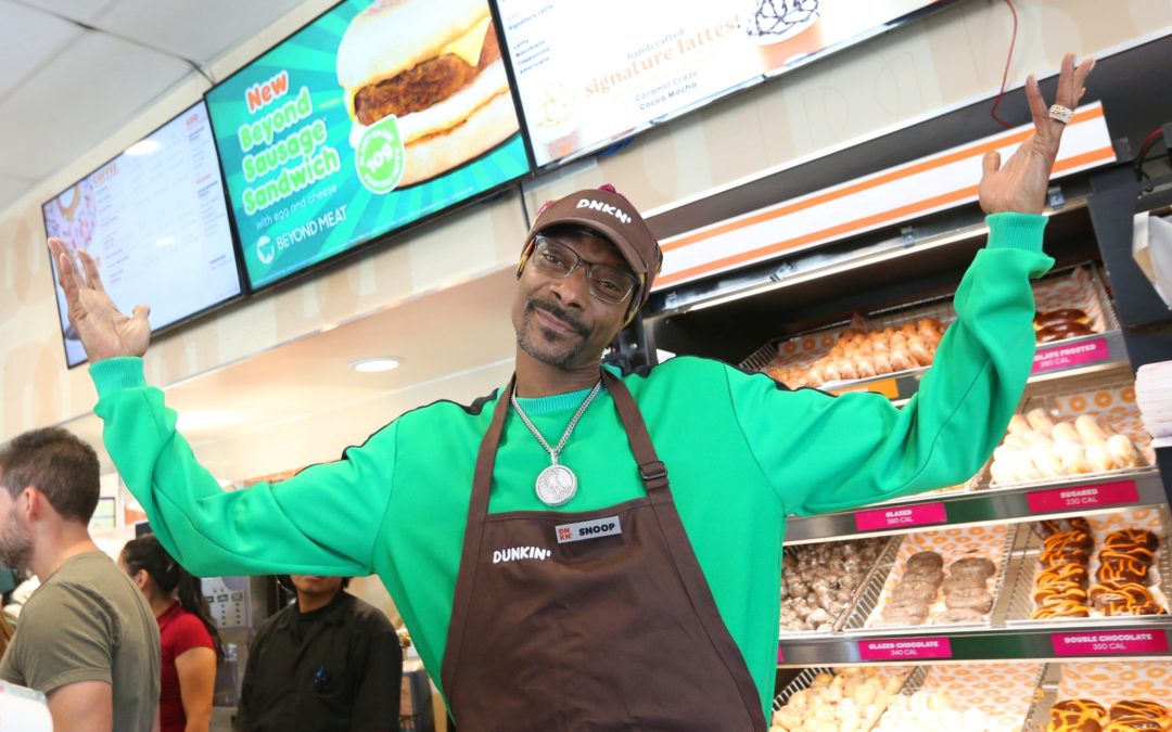 Snoop Dogg made a sandwich for Dunkin’ and it comes with a donut bun.